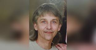 Obituary information for John Luther Rhodes Jr.