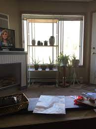 To account for the caulk along the windowsill, i routed a beveled edge along the shelf's bottom. Bookshelf In Front Of Window
