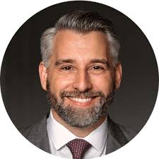 A Credit Hedge You Get Paid to Hold? Understanding Positive Return  Expectations for Quality-Junk