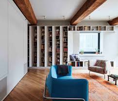 One of the things that really annoys me as i walk around is 45 degree bends in brick fences like this photo. The Brooklyn Publisher S Loft Is Designed To House An Enormous Book Collection