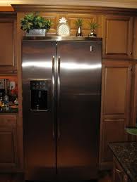 Might Was Well Decorate Top Of Fridge Who Can Reach Stuff In The Cabinet Above It Fridge Decor Farmhouse Kitchen Decor Kitchen Decor