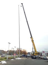 we are installing a 100 foot american flag pole at our dealership this week one of the biggest flags in all of s toyota dealership rockingham honda dealership foot american flag pole