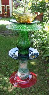 Spread the epoxy on the edges of one of the pieces of glass you need to glue, using a toothpick. A Montana Life Bird Bath Completed Diy Bird Bath Glass Bird Bath Bird Bath Garden