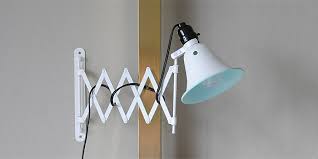 The cage light shown is not ikea but you can use the brunsta cage lights from ikea instead. Diy Ikea Hack Accordion Sconces The Gathered Home