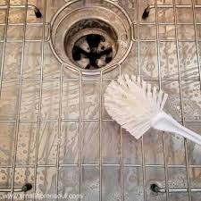 This soft flexible plastic mat is designed to sit in your kitchen sink to protect the sink and dishes. Why You Should Ditch Your Sink Grid Now Girl Just Diy