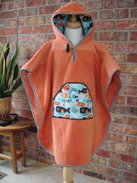 I actually got the idea from some character hooded towel ponchos i saw in bed, bath, & beyond and thought i could easily recreate it, but with a simpler look and comfier. Hood Towel Poncho For Toddler S Use At Bath Or Beach Kids Poncho Baby Clothes Patterns Altering Clothes