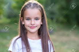 Only blonde hair with blue eyes are pretty. Pretty Little Girl With Long Brown Hair Posing Summer Nature Outdoor Kid S Portrait Beautiful Child S Face Stock Photo Picture And Royalty Free Image Image 128508527