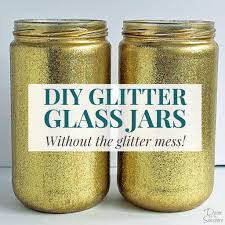 How to make a pretty diy gold and glittered mason jar centerpiece for gifts or a wedding, bridal shower, baby shower, or any special occasion. Diy Glitter Glass Jars Without The Glitter Mess