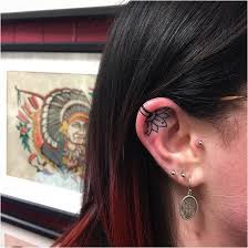 It's whether tattoos should be covered and piercings should be removed while in the workplace. Tattoo Websta Trailertrashtattoo Inner Ear Flower For Caitlin Thanks For The Trust Tattooed By Clayton Tattoo T Inner Ear Tattoo Cartilage Tattoo Tattoos
