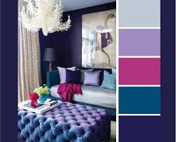 Shades of gold, dark purple, and terra cotta provide a bold color scheme. 30 Creative Color Schemes Inspired By The Color Wheel Architecture Design Room Color Schemes Room Colors Living Room Color Schemes