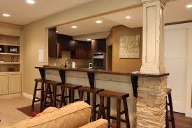 This setup means someone can easily mingle with and serve guests without having the remains of the meal prep on full display. Home Living Blog Kitchen Half Wall Breakfast Bar