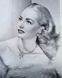 What is the time period of the early 1900s photo of family members?