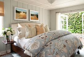 It is decorated with a geometric pendant light and an abstract artwork mounted above the. Small Shingle Beach Cottage With Coastal Interiors Home Bunch Interior Design Ideas