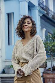 Whether you're a lucky curly goddess or a great experimenter who loves to have tons of bounce and movement in her hair, you will. Curly Haircuts For Round Faces All Things Hair Us