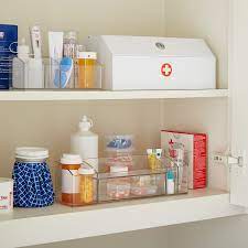 The shelves are tempered glass. Medicine Cabinet Organizer Linus Medicine Cabinet Organizer The Container Store