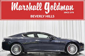 Image result for Slate Blue 2010 Aston Martin