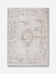 Black and white alternating stripes blend together from a distance, ensuring a cohesive look for whatever room this rug is placed in. Fading World Medallion Rug Form Louis De Poortere Salt Pepper 8383 Louis De Poortere Store