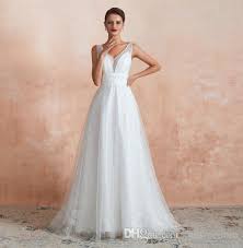 2020 Heavy Pearls V Neck Wedding Dresses Backless A Line Floor Length Designer Wedding Dresses Bridal Gown Real Image