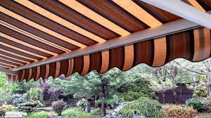 Motorized Retractable Awning Fabric By Sunbrella Motor By Somfy Covered Patio Retractable Awning Patio