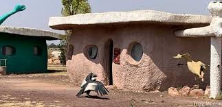Although it's not an actual city, visitors can tour the large, colorful concrete buildings. Bedrock City And Raptor Ranch Williams Arizona