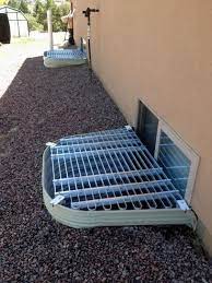 Expanded metal keeps out debris, while still allowing light in. Adjust A Grate 34 37 In X 45 60 In Adjustable Aluminum Window Well Grate L9 The Home Depot Window Well Window Well Cover Window Well Covers