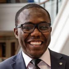 PERI faculty members (from left) Steven Sprick Schuster, Daniel Smith, and  Ennio Piano celebrate PERI Fellow Protik Nandy's suc