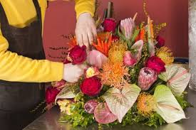 How To Make Christmas Flower Arrangements Ehow Uk Christmas Flower Arrangements Flower Arrangements Funeral Flowers