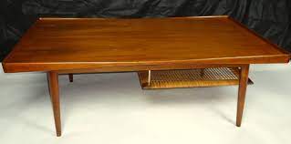 Maybe you would like to learn more about one of these? Poul Jensen Selig Coffee Table Teak And Cane Denmark 1950s For Sale At 1stdibs
