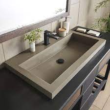 An exclusive design, this hand hammered brass trough bathroom sink is handcrafted making each sink slightly different than the other. Trough 3619 36 Inch Concrete Trough Bathroom Sink Native Trails