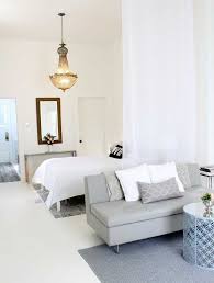 9 Super Stylish Studios That Prove One Room Is Enough Studio Apartment Divider Tiny Studio Apartments Small Apartment Design