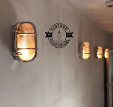 Outdoor oval bulkhead outside wall light security bulk head exterior lamp garden. Walsingham Caged Bulkhead Industrial Wall Light Ceiling Etsy Industrial Wall Lights Ceiling Lights Bulkhead Light
