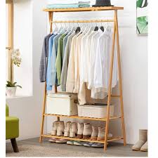 Our clothing & closet storage category offers a great selection of garment racks and more. Asfairy Home Bamboo Garment Coat Clothes Hanging Heavy Duty Rack With Top Shelf And 2 Tier Shoe Clothing Storage Organizer Shelves With Top Shelf Bamboo Coat Clothes Hanging Rack Buy Online In Turkey At