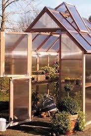 My mom wanted a patio. 30 Diy Backyard Greenhouses How To Make A Greenhouse