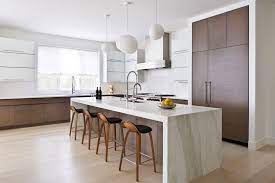 Clean modern kitchen, recently updated with a marble waterfall island, white shaker cabinets, gray quartzite countertops, stainless steel appliances and modern furnishings. 30 Beautiful Kitchens With Waterfall Islands Chairish Blog Modern Kitchen Island Modern Kitchen Design Interior Design Kitchen