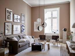 dit beige interieur heeft een balkon waar je nooit meer weg wilt deco salon canape taupe deco appartement idee deco mur salon