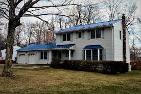 When the time comes to replace or paint your siding or to replace your roof, it's important to coordinate the colors of your entire facade. Royal Blue Standing Seam Metal Roof With Snow Guards Installation In Rockaway N Traditional House Exterior Philadelphia By Global Home Improvement Houzz Uk
