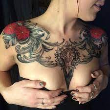 101 Best Chest Tattoos For Women 2020 Guide Chest Tattoos For Women Tattoos For Women Chest Piece Tattoos