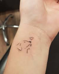 Stamp the paw print with a non toxic stamp pad and take it to the tattoo artist. Immaculate Small Dog Tattoos Small Dog Tattoos Small Tattoos Momcanvas