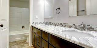 Choose a silicone caulk intended for use with bathroom fixtures. How To Remove Your Bathroom Sink And Vanity Dumpsters Com