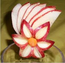 Interesting Ideas Fruit And Vegetable Art Fleur De Pomme Centre Carotte Pique Centrale Pour Accrocher La Rondel Amazing Food Art Fruit Carving Food Sculpture