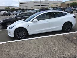 White Tesla Model 3 Aero Covers Removed Pulpconnection