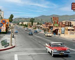 Colorized photo of Sunset Boulevard in the Palisades. (1950s)