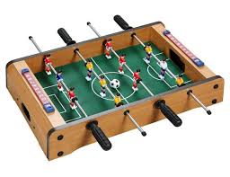 A foosball table can be the centerpiece of your game room. Foosball Table Red Fox Party Supplies