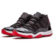 Released In December The Air Jordan 11 Retro Bred 2012 Brings Back The Famous Black Red Colorway To The Jordan Air Jordans Nike Air Jordan 11 Air Jordan 11