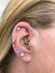 daith tragus forward helix and helix piercing white and rose gold bvla body vision los angel tragus forward helix forward helix piercing earings piercings