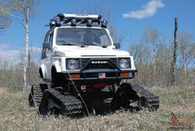Check spelling or type a new query. Suzuki Samurai Snowcat Jeep Rockcrawler 4x4 Lifted Tracks