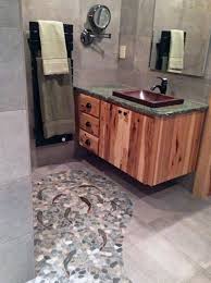 Make sure that your pattern is set and you are satisfied with the design that. Trout Tile This Fabulous Trout Shaped Tile And Rock Stream Bathroom Floor Even Shower Tile Shower Floor Tile Bathroom Flooring