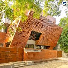 I've also seen a small brick wall run around the pool instead of garden edging. A Rustic Yet Futuristic Parametric Brick Facade Wraps This Residential Home In Coimbatore By Murali Architects