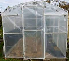 This miniature greenhouse is made out of pvc for the frame. Building A Pvc Greenhouse Ramblings Of A Rose Maniac