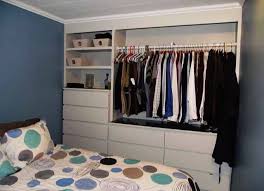 Light gray linen bed, crisp white. Ikea Hack Built In Wardrobe Using Malm Dressers Living In Flux